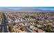 Aerial view of neighborhood with desert mountain backdrop at 7528 Pinto Bluff St, Las Vegas, NV 89131