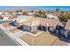 Single-story house with tile roof, driveway, and mountain backdrop at 7528 Pinto Bluff St, Las Vegas, NV 89131