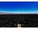 Aerial view of single-story house with desert landscape at 7528 Pinto Bluff St, Las Vegas, NV 89131