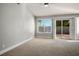 Bright bedroom with tile floors and walk-in closet at 7528 Pinto Bluff St, Las Vegas, NV 89131