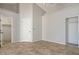 Spacious bedroom with tile floors and dual closets at 7528 Pinto Bluff St, Las Vegas, NV 89131