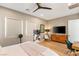 Main bedroom with large windows, ceiling fan, and plenty of natural light at 8606 Dusty Quail Dr, Las Vegas, NV 89148