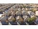 Wide aerial view of a neighborhood of houses at 8789 Ashley Park Ave, Las Vegas, NV 89148