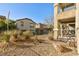 Landscaped backyard with gravel and desert plants at 8789 Ashley Park Ave, Las Vegas, NV 89148