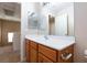 Bathroom with single vanity and a view of the hallway at 8789 Ashley Park Ave, Las Vegas, NV 89148