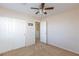 Bedroom with double door closet and ceiling fan at 8789 Ashley Park Ave, Las Vegas, NV 89148