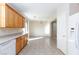 Kitchen with wood cabinets and tile floor at 8789 Ashley Park Ave, Las Vegas, NV 89148