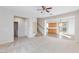 Spacious living room with view of kitchen and stairs at 8789 Ashley Park Ave, Las Vegas, NV 89148