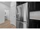 Stainless steel appliances and dark cabinetry highlight this modern kitchen at 965 Nevada State Dr # 15103, Henderson, NV 89002