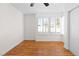 Bright bedroom with hardwood floors and plantation shutters at 9741 Horizon Hills Dr, Las Vegas, NV 89117