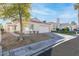 Single-story house with a two-car garage and nicely landscaped front yard at 9741 Horizon Hills Dr, Las Vegas, NV 89117