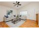 Bright living room with comfortable seating, shuttered windows, and stylish decor at 9741 Horizon Hills Dr, Las Vegas, NV 89117