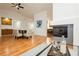 Open living space with a dining area, fireplace, and seamless flow to the kitchen at 9741 Horizon Hills Dr, Las Vegas, NV 89117