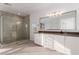 Modern bathroom with double vanity and walk-in shower at 816 Franklin Ave, Las Vegas, NV 89104