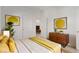 Bright bedroom with mid-century modern furniture and yellow accents at 1303 S 8Th St, Las Vegas, NV 89104