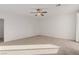 Bright and airy bedroom with ceiling fan and carpeted floors at 1303 S 8Th St, Las Vegas, NV 89104