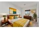 Cozy bedroom with wood bed frame and mid-century modern nightstands at 1303 S 8Th St, Las Vegas, NV 89104