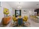 Bright dining room with mid-century modern furniture and a stylish chandelier at 816 Franklin Ave, Las Vegas, NV 89104