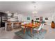 Open concept dining room with modern light fixture at 816 Franklin Ave, Las Vegas, NV 89104