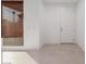 Bright and airy entryway with neutral tile flooring and a modern door at 1303 S 8Th St, Las Vegas, NV 89104