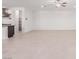 Large living area with tile flooring and access to kitchen at 816 Franklin Ave, Las Vegas, NV 89104