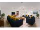 Bright and airy living room with navy and yellow furniture at 816 Franklin Ave, Las Vegas, NV 89104