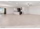 Spacious living room with tile floors and a ceiling fan at 816 Franklin Ave, Las Vegas, NV 89104