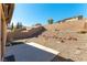 Landscaped backyard with gravel and a patio at 10957 Civiletti St, Las Vegas, NV 89141