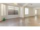 Bright dining area with tile floors and large windows at 10957 Civiletti St, Las Vegas, NV 89141