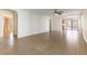 Spacious living room featuring tile floors and a ceiling fan at 10957 Civiletti St, Las Vegas, NV 89141