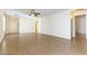 Open living area with tile floors and neutral wall colors at 10957 Civiletti St, Las Vegas, NV 89141