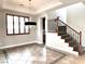 Elegant dining room with tile flooring and a stunning chandelier at 12133 Vista Linda Ave, Las Vegas, NV 89138