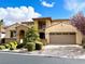 Beautiful two-story home with landscaping and attached garage at 12133 Vista Linda Ave, Las Vegas, NV 89138