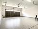 Finished garage with epoxy flooring and overhead storage at 12133 Vista Linda Ave, Las Vegas, NV 89138