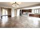 Open concept living room with kitchen and dining area views at 12133 Vista Linda Ave, Las Vegas, NV 89138