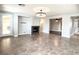 Bright living room featuring a fireplace and large windows at 12133 Vista Linda Ave, Las Vegas, NV 89138