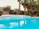 Inviting swimming pool with spa and lush landscaping at 12133 Vista Linda Ave, Las Vegas, NV 89138