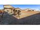 Spacious backyard with swing set and covered patio at 1413 Fantastic Ct, North Las Vegas, NV 89081