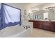 Double vanity bathroom with soaking tub and separate shower at 1413 Fantastic Ct, North Las Vegas, NV 89081