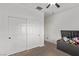 Bright bedroom with double door closet and toy chest at 1413 Fantastic Ct, North Las Vegas, NV 89081