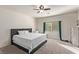 King-size bed in bright and airy main bedroom with ensuite at 1413 Fantastic Ct, North Las Vegas, NV 89081