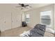 Bright bedroom with double door closet and window coverings at 1413 Fantastic Ct, North Las Vegas, NV 89081