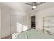 Bedroom with large closet and ceiling fan at 1413 Fantastic Ct, North Las Vegas, NV 89081