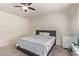 Spacious bedroom with king-size bed and ample natural light at 1413 Fantastic Ct, North Las Vegas, NV 89081