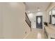 Entryway with tiled floor, staircase, and a console table at 1413 Fantastic Ct, North Las Vegas, NV 89081