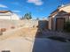 Large backyard with shed and block wall. Needs landscaping at 1487 Elaine Dr, Las Vegas, NV 89142