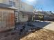 Backyard with covered patio and dog at 1487 Elaine Dr, Las Vegas, NV 89142