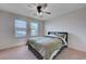 Comfortable bedroom with ceiling fan and neutral decor at 152 Belmont Canyon Pl, Henderson, NV 89015