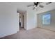 Bright bedroom with ceiling fan and carpet at 152 Belmont Canyon Pl, Henderson, NV 89015