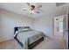 Bedroom with ceiling fan, and access to another room at 152 Belmont Canyon Pl, Henderson, NV 89015